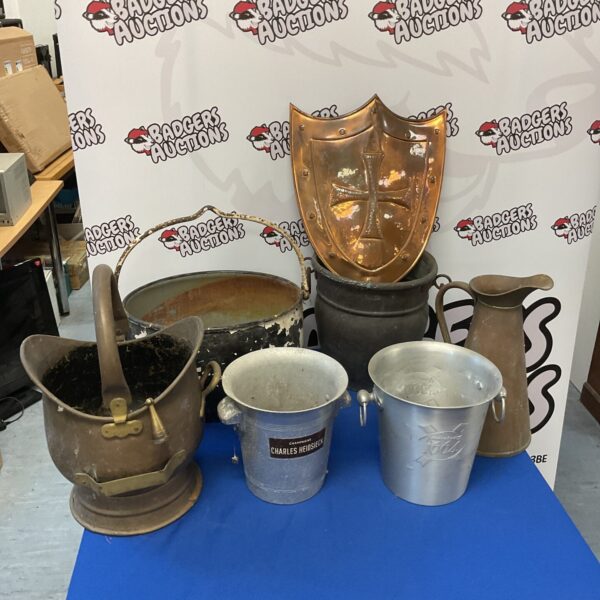 Vintage mixed metalware lot featuring a copper shield, scuttle, and cauldron.