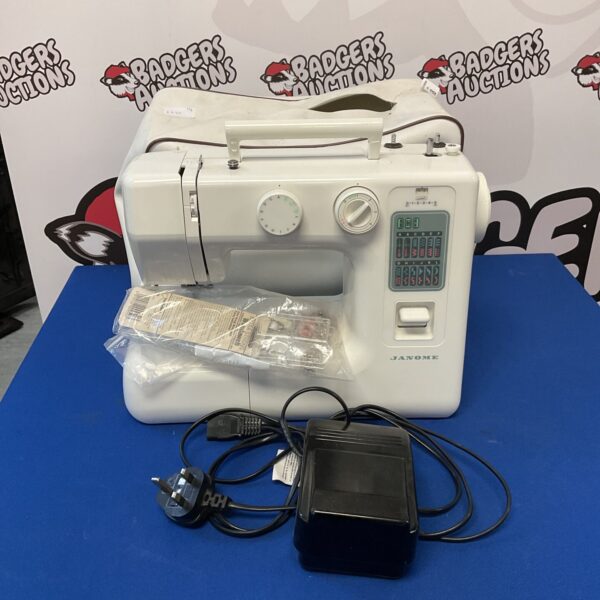 White Janome jd 1822 electric sewing machine in used condition.