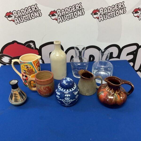 Mixed lot of vintage jugs and vases including Disney and ginger jar.