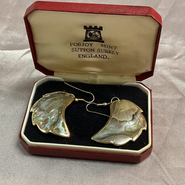 Shimmering mother of pearl leaf earrings with a post fitting.