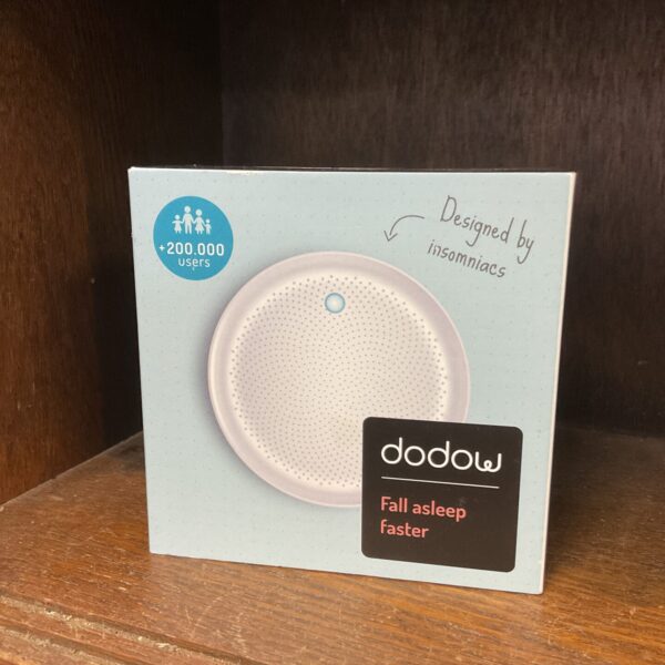 White Dodow sleep aid device for relaxation and better sleep.