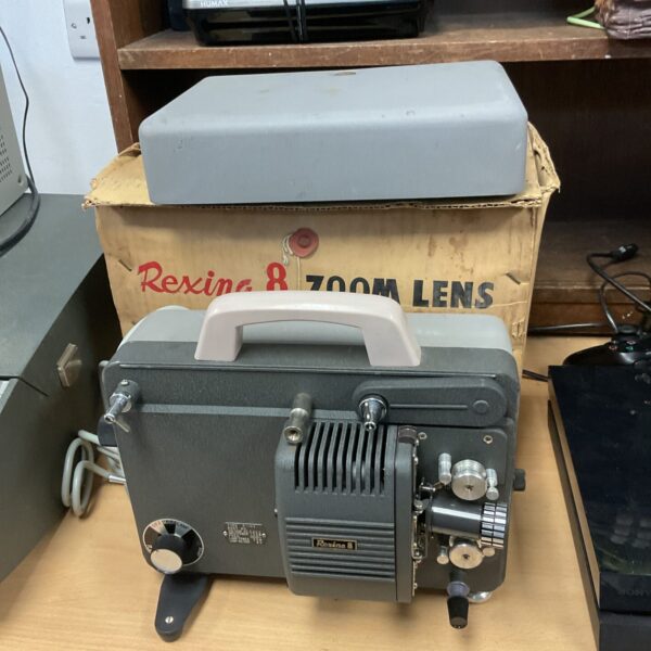Vintage Rexina 8 zoom lens projector in used condition.