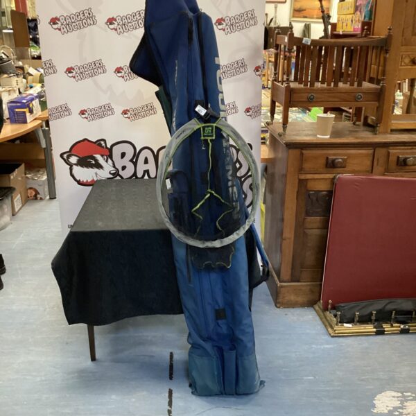 Diawa fishing rod bag with rods and landing net for angling.