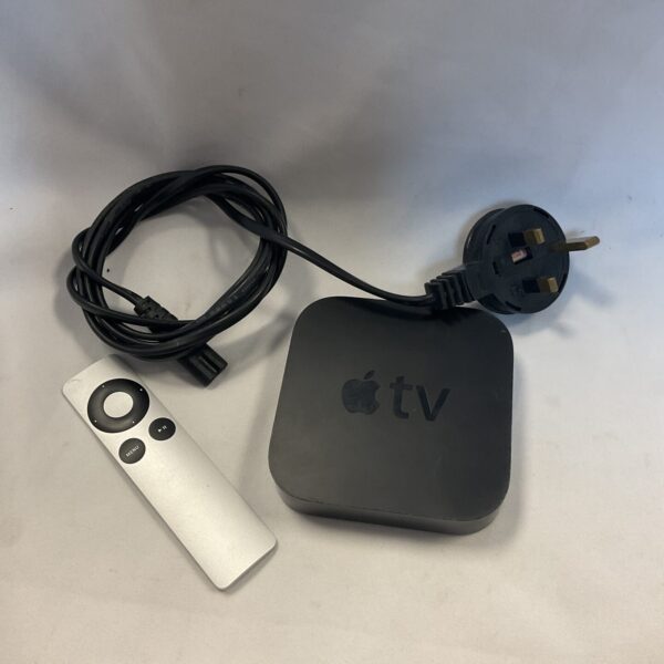 Apple TV box and remote control for streaming digital entertainment.