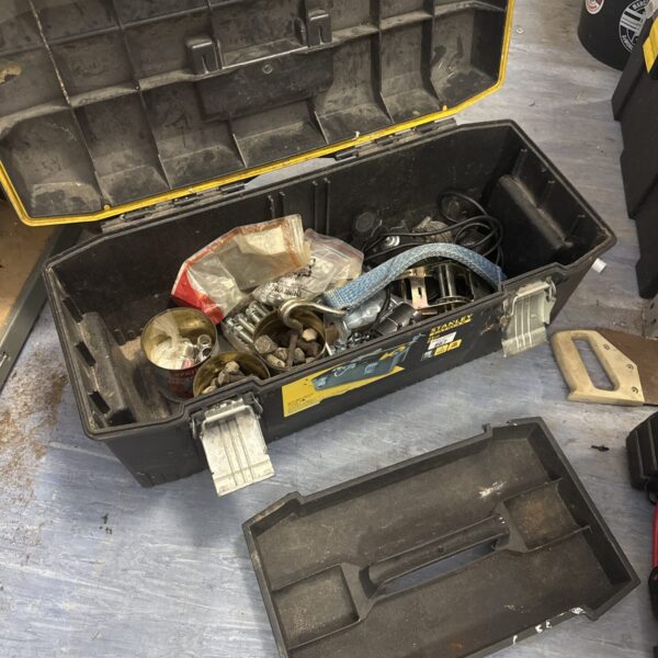 Large Stanley Fatmax toolbox filled with various tools and hardware.