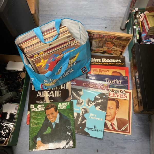 Lot of vintage country music vinyl records for collectors.