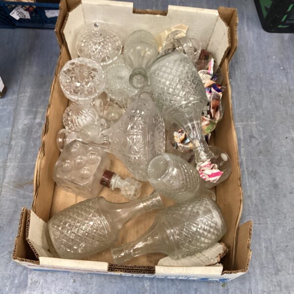 Collection of vintage glass decanters for barware and display.