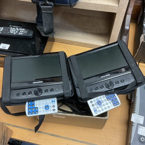 Nextbase in-car DVD players with remotes for car entertainment.