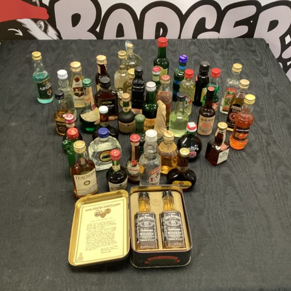 Diverse alcohol miniature collection including Jack Daniel's and Johnnie Walker.