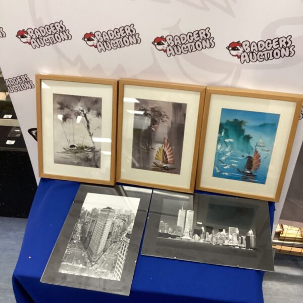 Framed Japanese prints and New York photographs for vintage wall art.