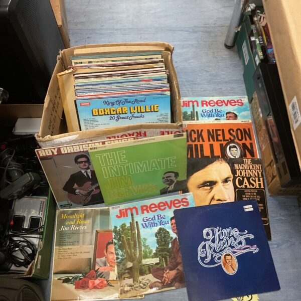 Assorted vinyl records in a lot, vintage music collection.