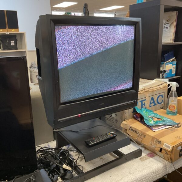 Vintage Ferguson 24 inch CRT television with remote control.
