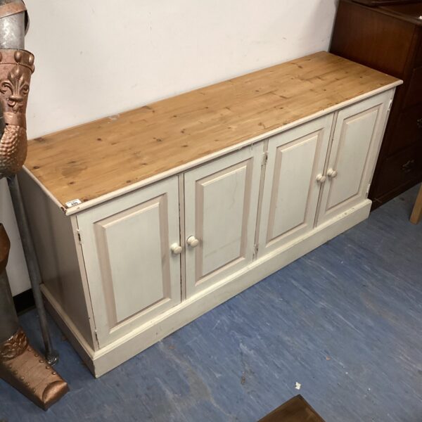 Vintage painted pine sideboard with cupboard space for storage.
