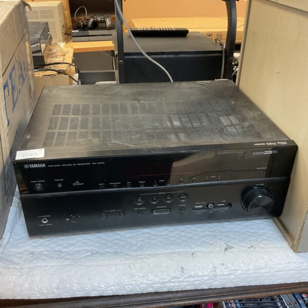 Black Yamaha RX-V673 AV receiver for home theater systems.