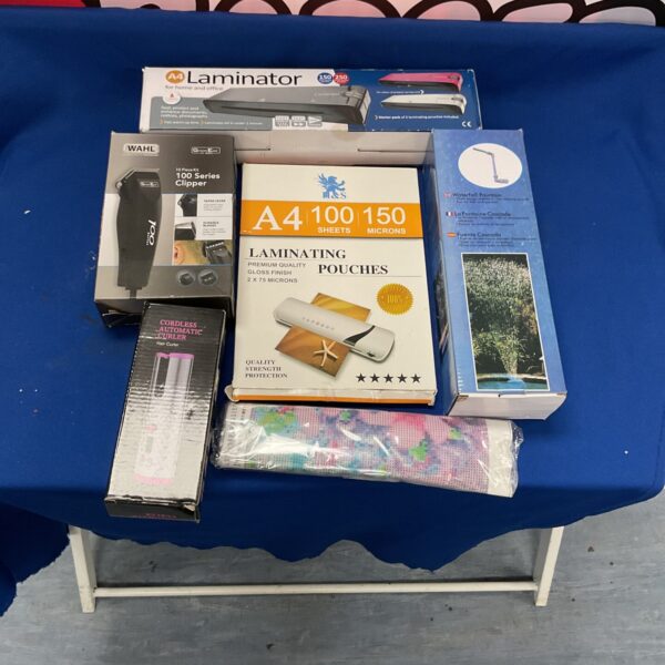 Mixed lot featuring a Wahl trimmer and A4 laminator for home office.