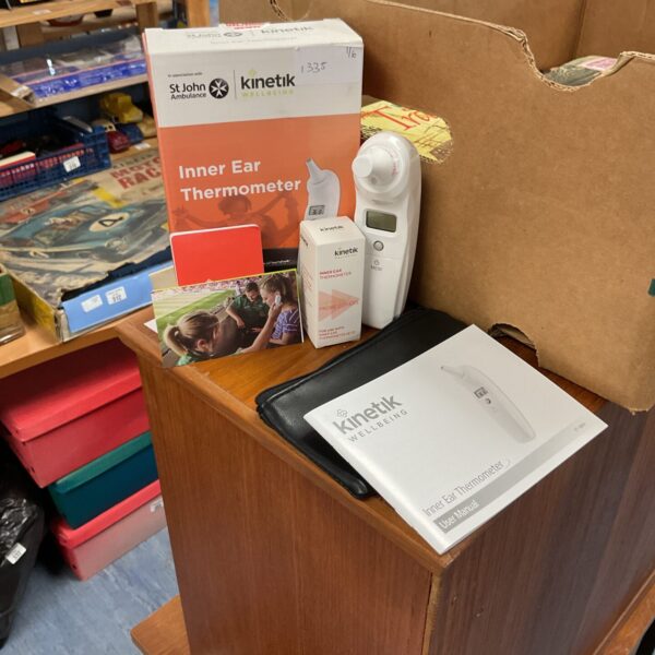 Kinetik ear thermometer model 135 in box.
