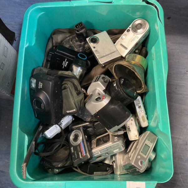 Vintage camera lot including Sony and Pentax film cameras for collectors.