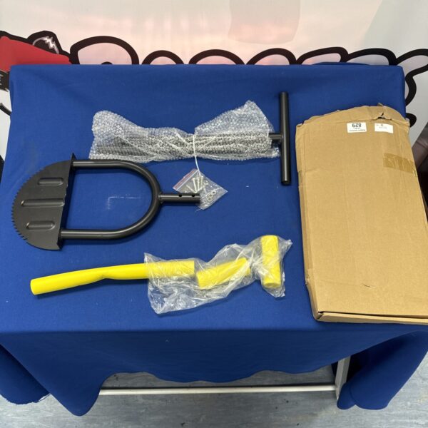 New garden edging tool still sealed in its original packaging.