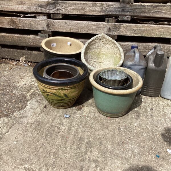 Selection of three vintage ceramic garden pots for garden decor.
