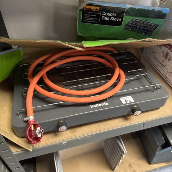 Used Halfords double gas stove with connecting hose for outdoor cooking.