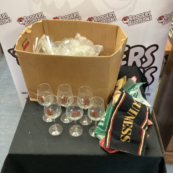 Mixed lot of pub glasses and beer mats for sale.
