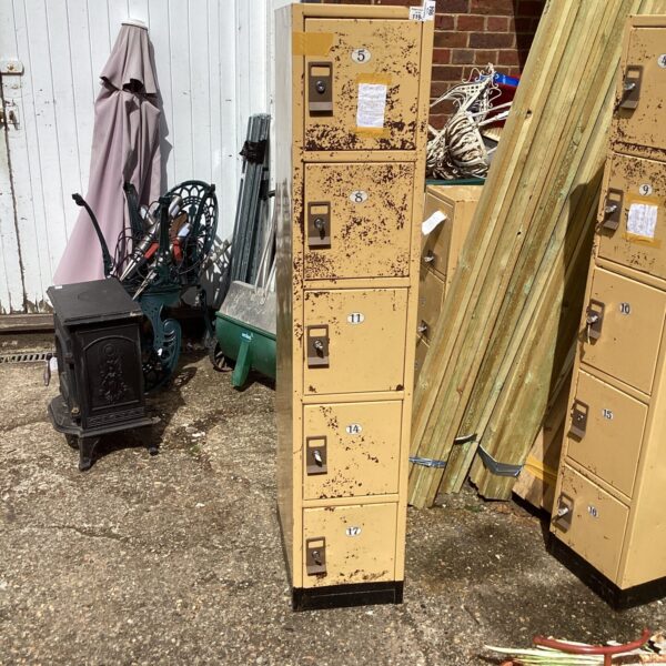 Group of five vintage metal lockers with key locks.