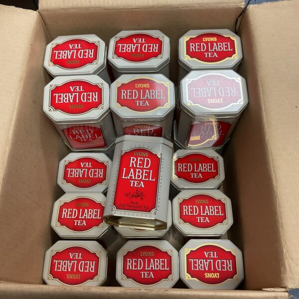 Wholesale lot of vintage Lyons Red Label tea tins for collectors.