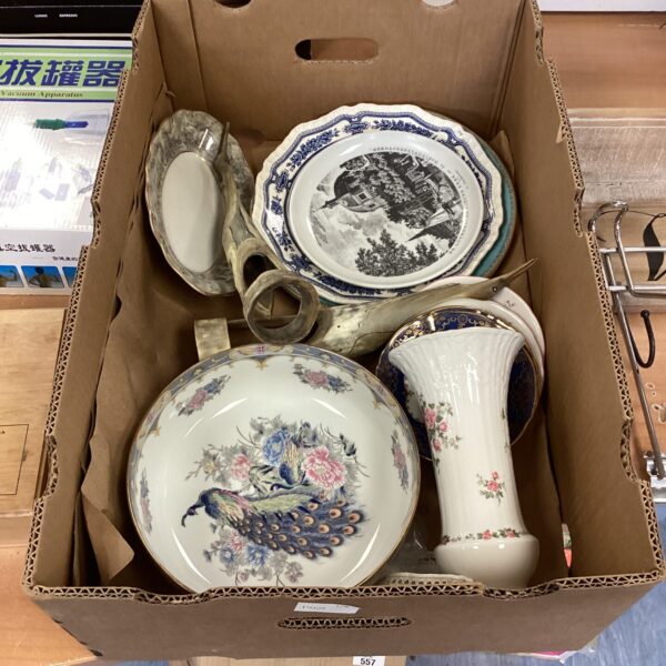 Mixed china lot with decorative plates, bowls, and horn egrets.