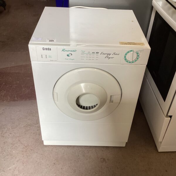 Front view of a vintage Creda Reversair tumble dryer.