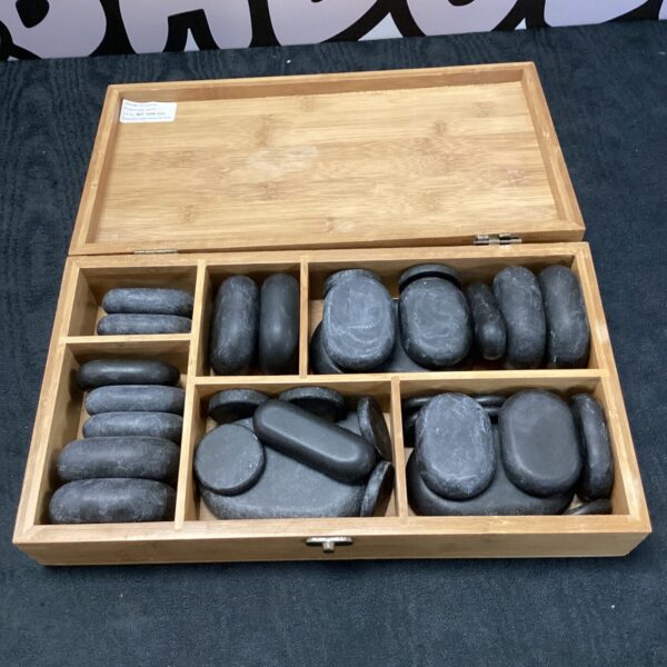 60-piece hot stone massage set with basalt stones.