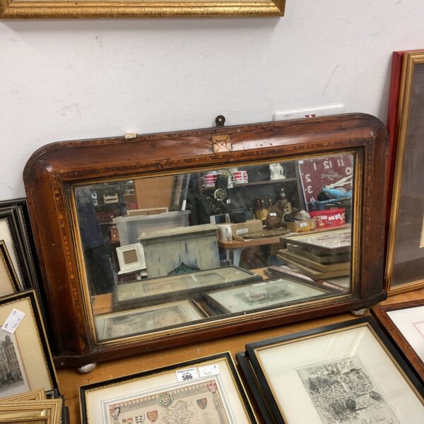 Ornate Victorian overmantle mirror with inlaid wood and gilt detailing.