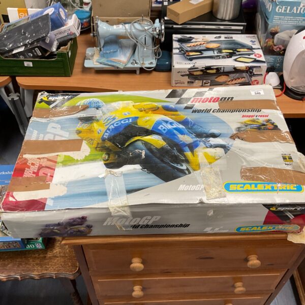 Boxed Scalextric MotoGP World Championship racing set for collectors.