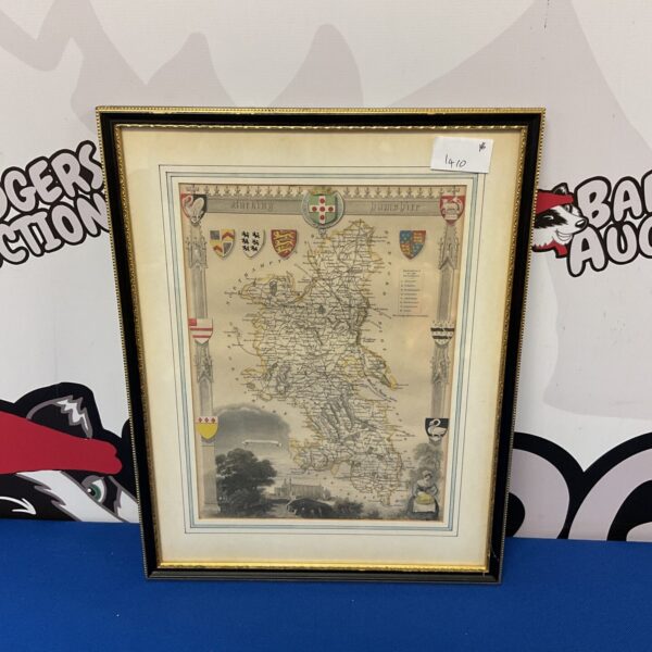 Antique map of Buckinghamshire in a decorative frame.