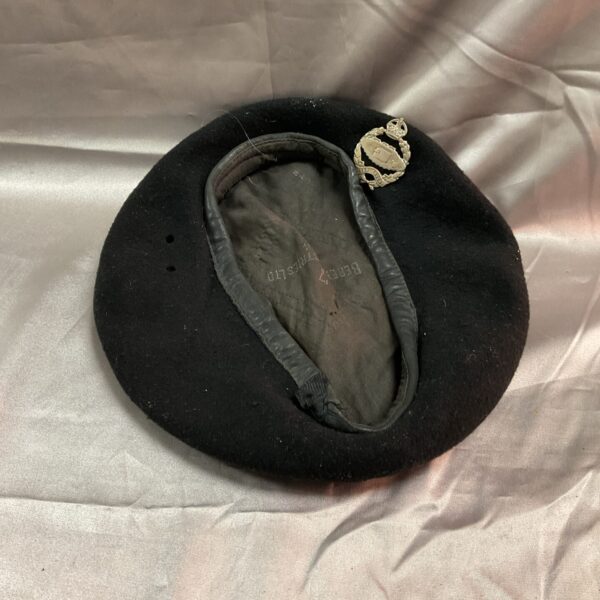 Vintage WWII British Tank Regiment beret with badge.