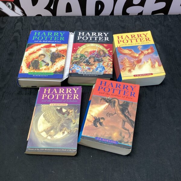 Lot of Harry Potter books, including first editions and error print.