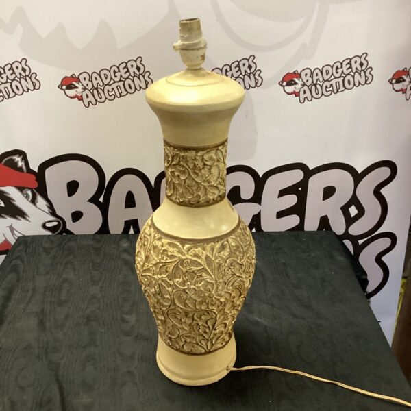 Vintage chalkware table lamp with floral design.