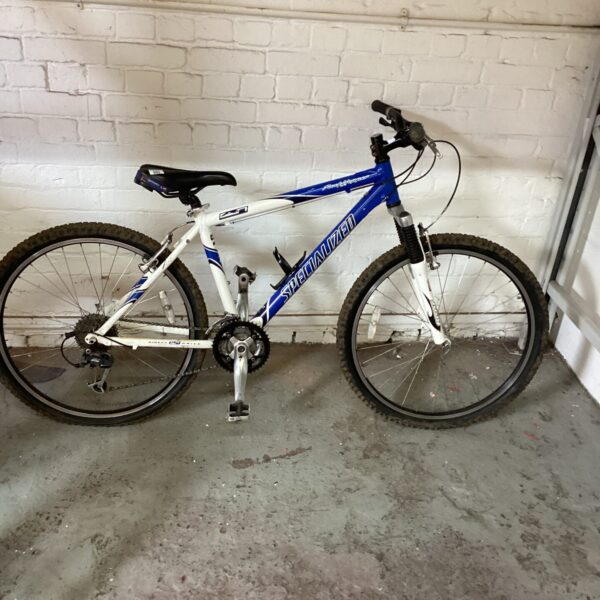 Side view of a vintage Specialized Rockhopper mountain bike.