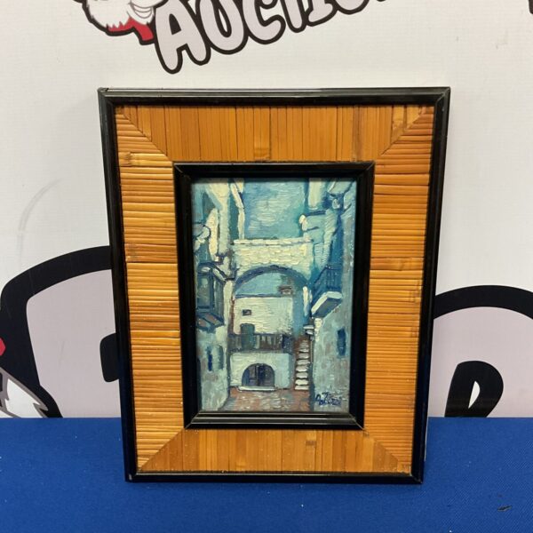 Signed Azizzi painting of a Mediterranean street scene at night.