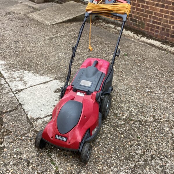 Mountfield electric lawn mower in a garden setting.