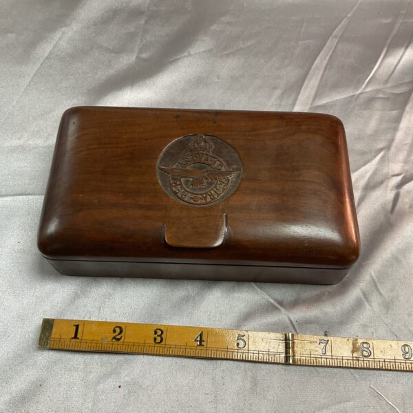 Vintage WWII RAF hand-carved mahogany cigarette box with emblem.