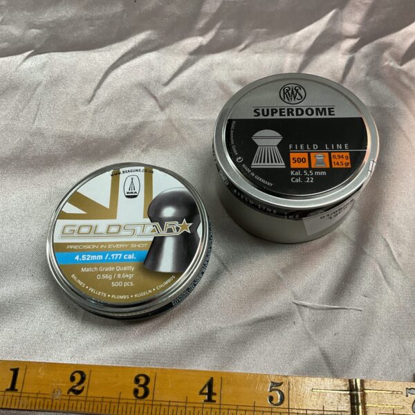Sealed tins of Goldstar .177 and Superdome .22 airgun pellets for shooting.