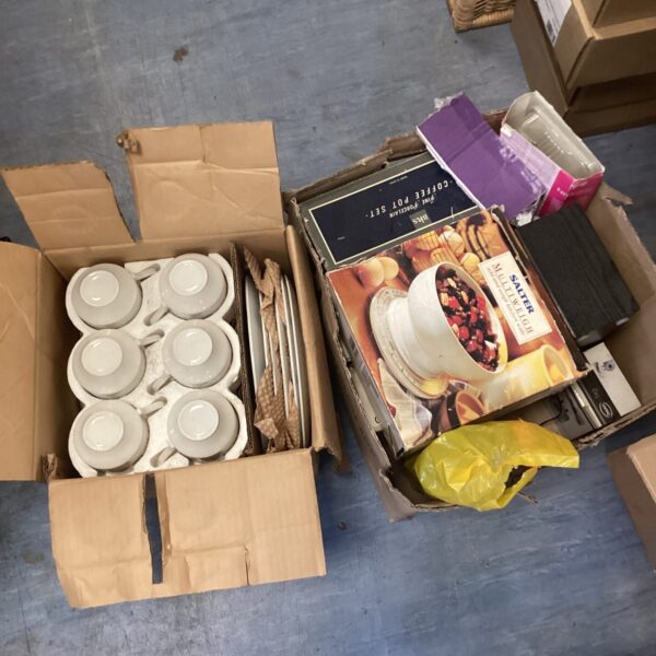 Mixed kitchenware lot with vintage cups and ceramic plates.