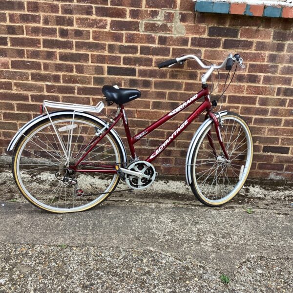 Red Terrano Advantage vintage bicycle with mudguards.