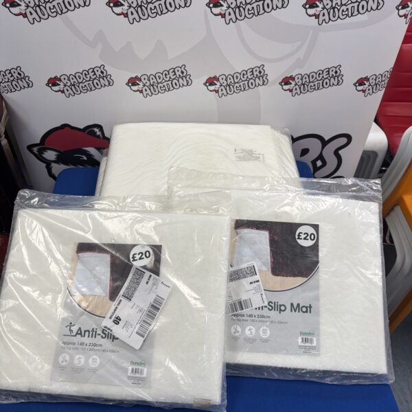 Assorted size rug anti slip mats for floor protection.