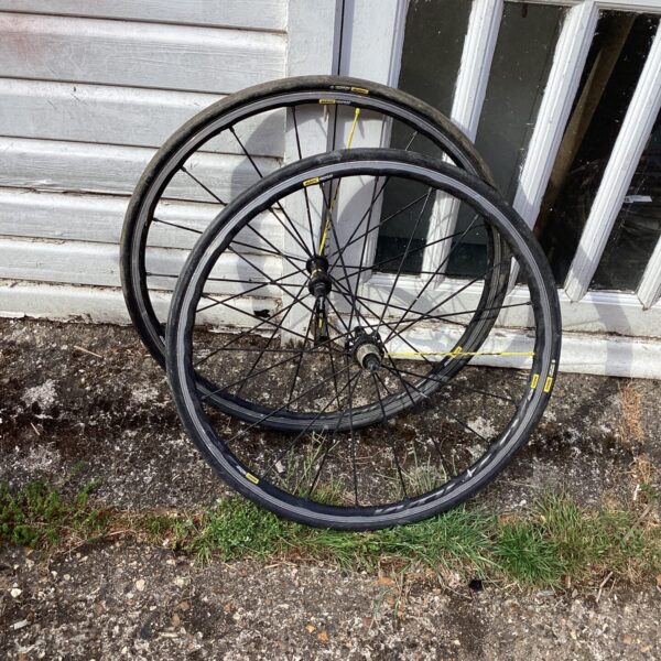 Black Mavic bike wheels for road cycling, used condition.