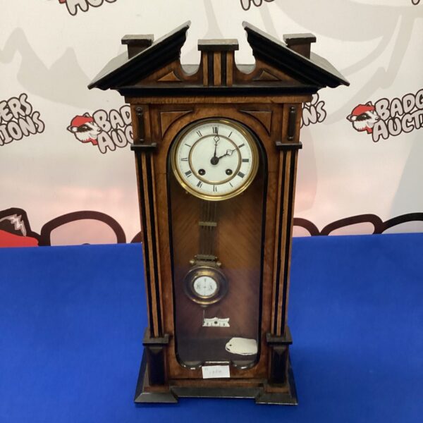 Antique 19th-century walnut Vienna wall clock for home decor.