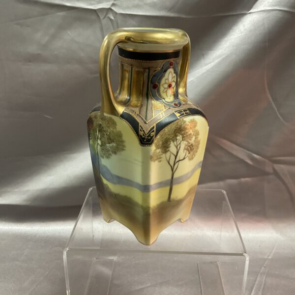 Vintage Noritake porcelain vase with landscape painting.