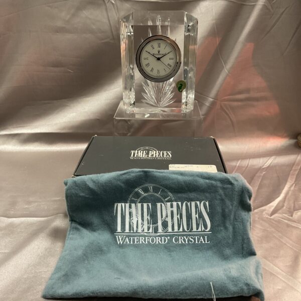 Waterford Crystal clock with Roman numeral dial in original packaging.