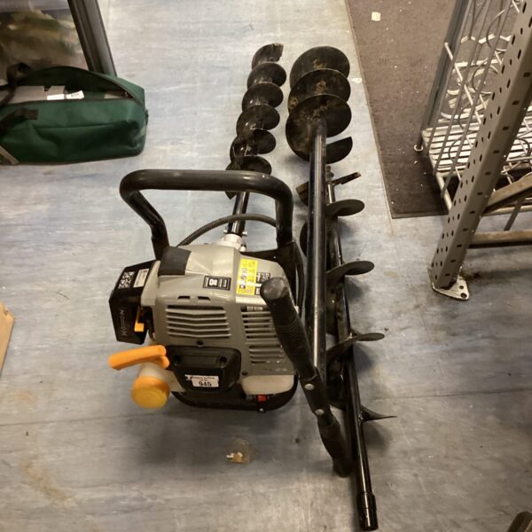 Titan petrol post hole drill with auger attachment.