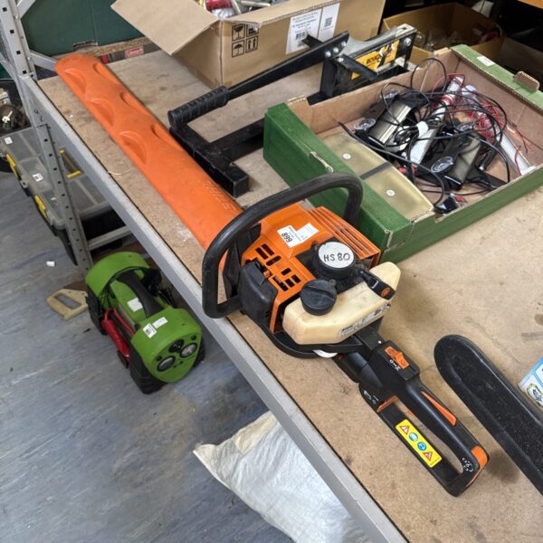 Stihl HS80 petrol hedge cutter for garden landscaping.